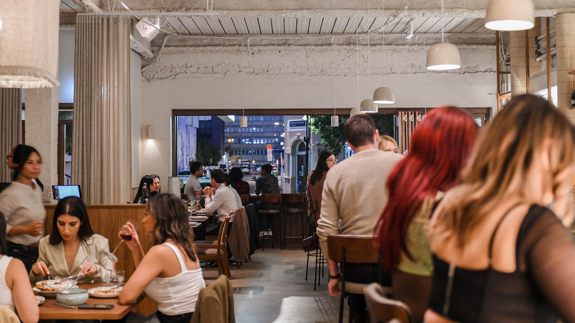Diners seated at Kiin restaurant in Adelaide.