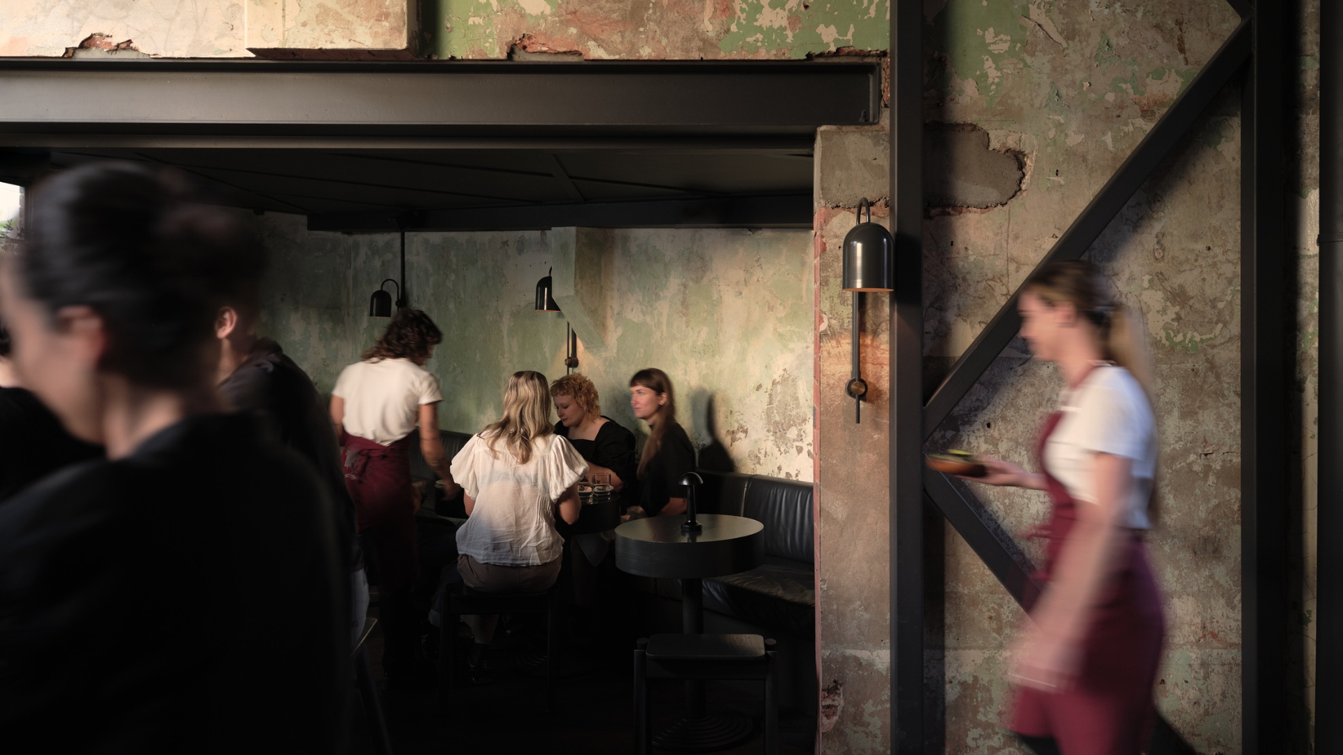 A candid photo of Agnes in Fortitude Valley, Brisbane. The picture shows diners and waitresses moving about.