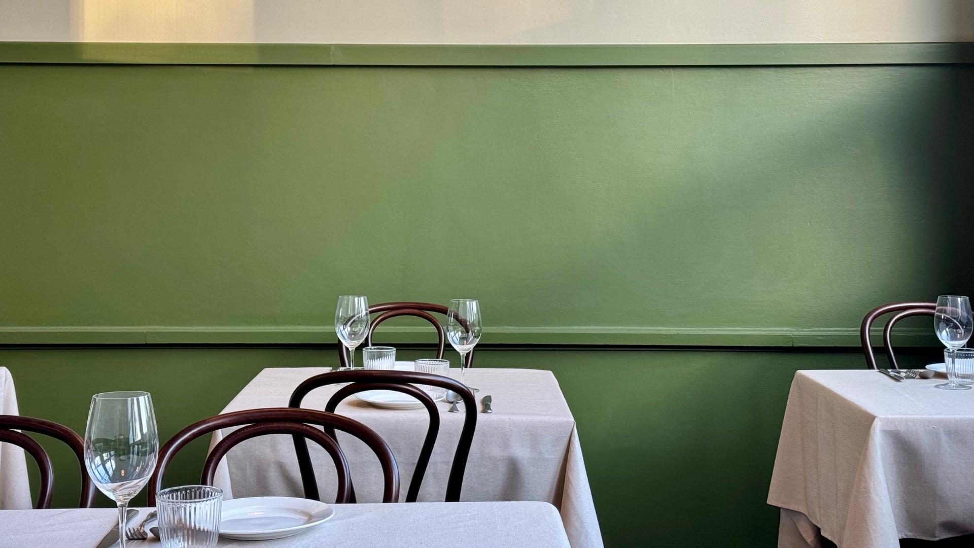 The green-walled dining room at Best Destination Dining Award-winner Staguni.