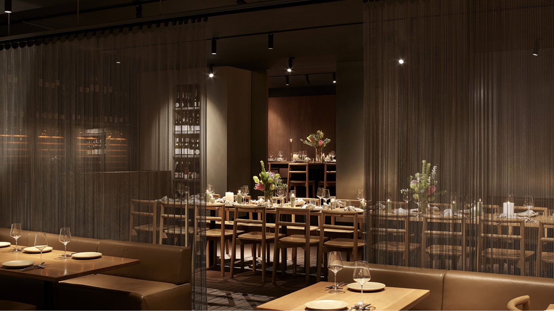 Open spaces, timber chairs and minimalist decor at ARU melbourne 