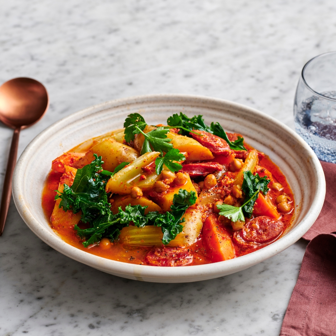 Spicy chorizo and chickpea braise with smoked almond romesco.