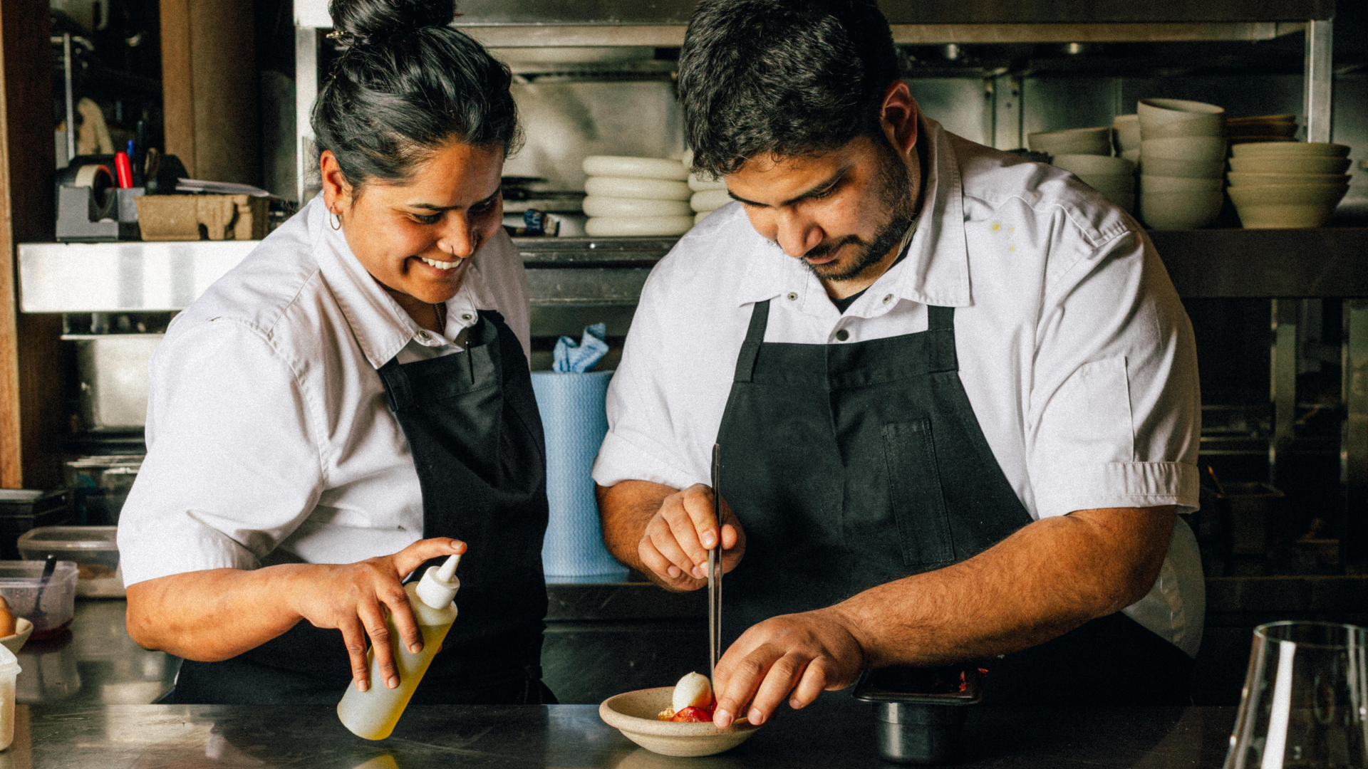 Chefs Saavni Krishnan and Sriram Aditya Suresh in the kitchen at Saadi in Melbourne
