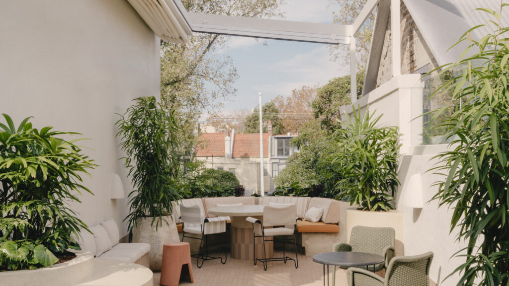 Airy terrace with plants and alfresco seating at The White Horse in Surry Hills Sydney