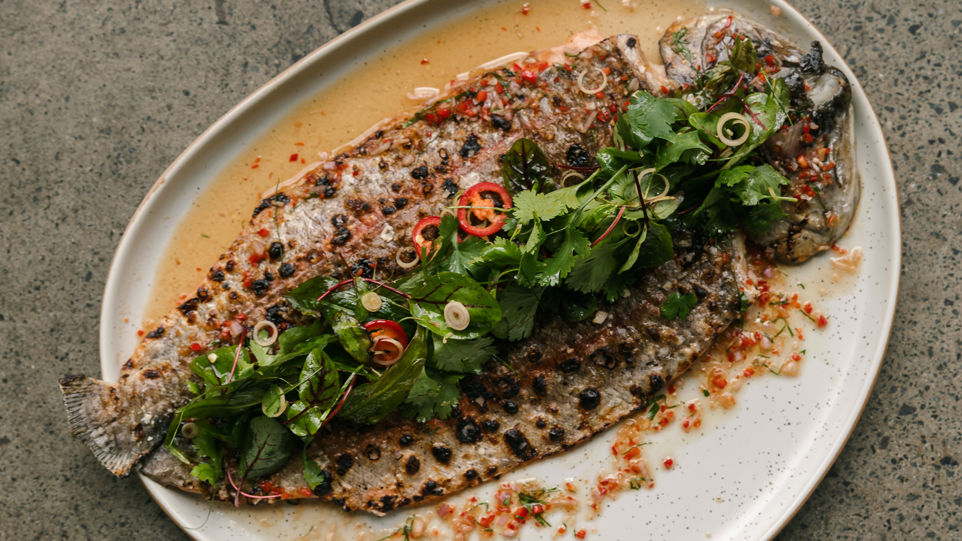 Rick Shores Gold Coast Asian inspired fish dish with coriander and chilli on top