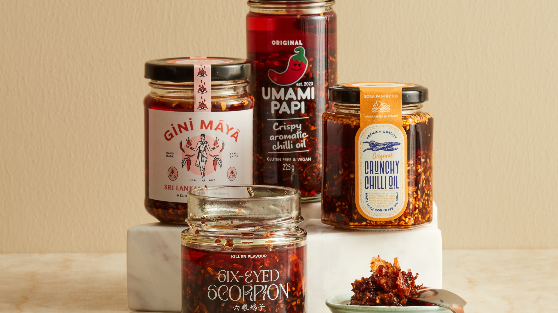 Six Eyed Scorpion chilli oil, Gini Maya chilli oil, Umami Papi chilli oil and Soka Pantry chilli oil